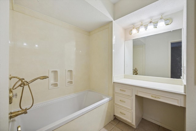 4040 San Felipe St Unit 135, Houston, TX 77027 - bathroom with tile patterned floors, vanity, and shower / bath combination