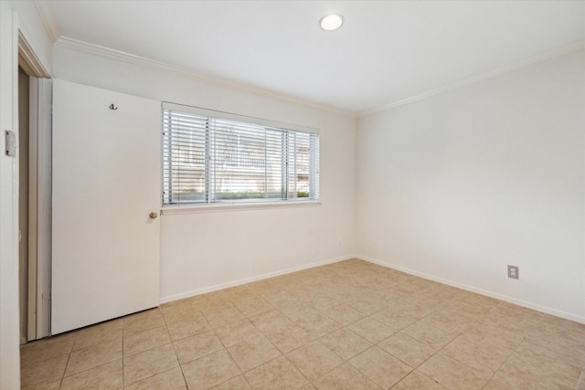 4040 San Felipe St Unit 135, Houston, TX 77027 - spare room featuring crown molding and light tile patterned floors