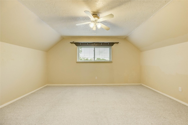 11823 Blair Meadow Dr, Meadows Place, TX 77477 - bonus room with carpet, vaulted ceiling, a textured ceiling, and a ceiling fan