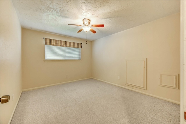 11823 Blair Meadow Dr, Meadows Place, TX 77477 - carpeted empty room featuring a ceiling fan and a textured ceiling