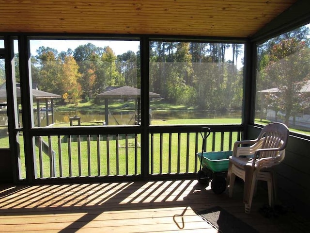 70 Lakeside, Trinity, TX 75862 - sunroom with a water view and healthy amount of natural light