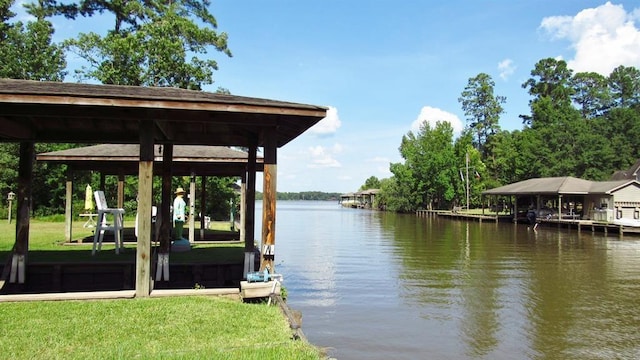 70 Lakeside, Trinity, TX 75862 - dock area with a water view and a lawn