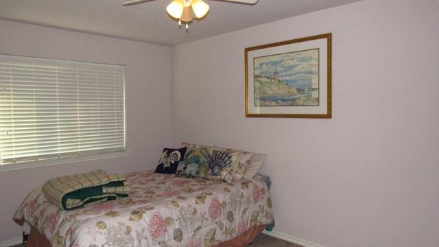 70 Lakeside, Trinity, TX 75862 - bedroom featuring a ceiling fan and baseboards