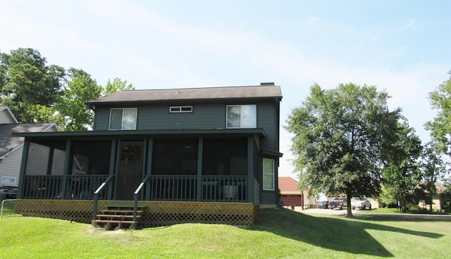 70 Lakeside, Trinity, TX 75862 - back of house with a sunroom and a yard