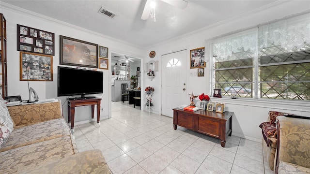 1314 Lawrence Ave, Pasadena, TX 77506 - living room featuring a ceiling fan, ornamental molding, and light tile patterned floors