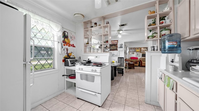 1314 Lawrence Ave, Pasadena, TX 77506 - kitchen featuring a ceiling fan, open shelves, white appliances, light tile patterned floors, and crown molding