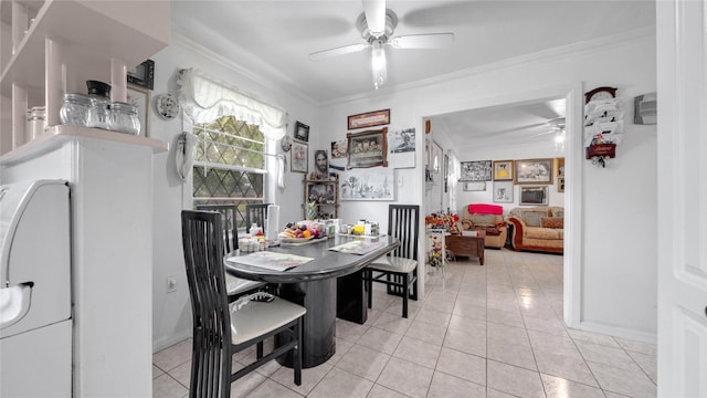 1314 Lawrence Ave, Pasadena, TX 77506 - dining room with a ceiling fan, crown molding, washer / clothes dryer, and light tile patterned flooring