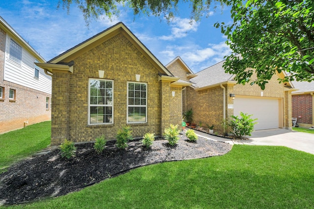 30041 Willow Walk Ln, Brookshire, TX 77423 - view of front facade featuring a front yard, concrete driveway, a garage, and brick siding