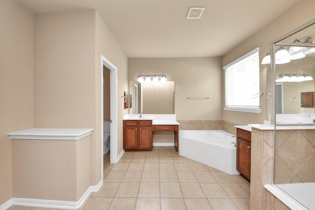 30041 Willow Walk Ln, Brookshire, TX 77423 - full bathroom with a bath, vanity, tile patterned floors, and tiled shower