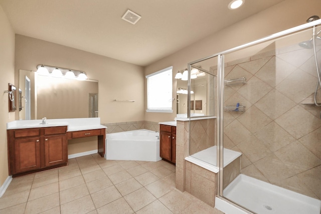 30041 Willow Walk Ln, Brookshire, TX 77423 - bathroom with two vanities, a stall shower, a garden tub, tile patterned floors, and recessed lighting