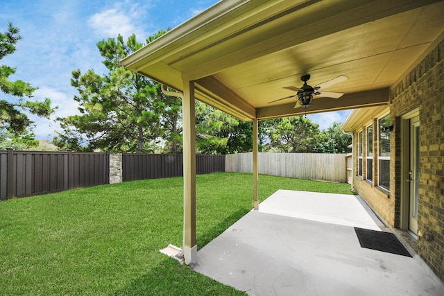 30041 Willow Walk Ln, Brookshire, TX 77423 - fenced backyard featuring a patio and a ceiling fan