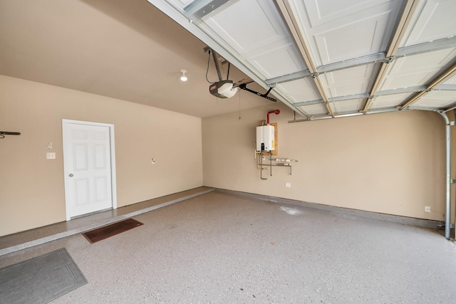 30041 Willow Walk Ln, Brookshire, TX 77423 - garage with a garage door opener and water heater