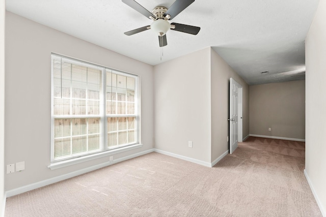 3527 Acorn Way Ln, Spring, TX 77389 - carpeted empty room featuring baseboards and a ceiling fan