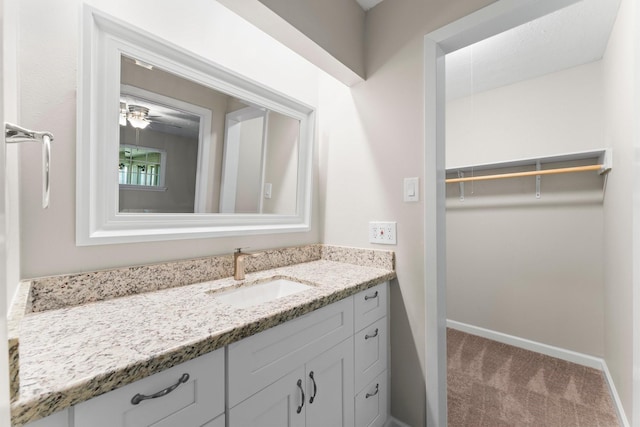 3527 Acorn Way Ln, Spring, TX 77389 - bathroom featuring vanity and a walk in closet