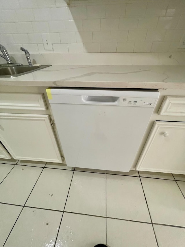 4202 Boone Rd, Houston, TX 77072 - laundry room with tile patterned flooring