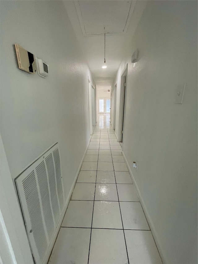 4202 Boone Rd, Houston, TX 77072 - corridor with attic access and light tile patterned floors