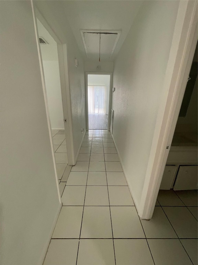 4202 Boone Rd, Houston, TX 77072 - hall with attic access and light tile patterned floors