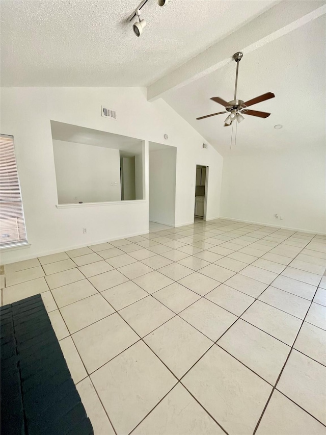 4202 Boone Rd, Houston, TX 77072 - unfurnished room featuring a textured ceiling, light tile patterned floors, a ceiling fan, and rail lighting