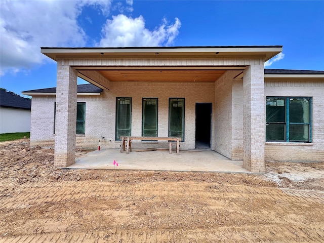 1162 Rd 6604, Dayton, TX 77535 - back of property with a patio