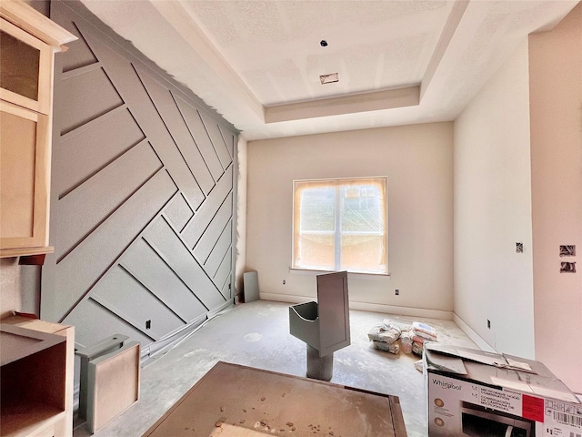 1162 Rd 6604, Dayton, TX 77535 - empty room featuring a tray ceiling and baseboards