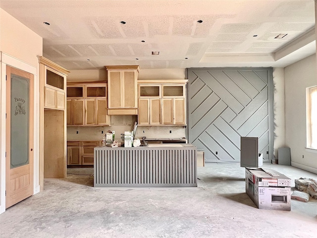 1162 Rd 6604, Dayton, TX 77535 - kitchen with a center island, light brown cabinets, and unfinished concrete flooring