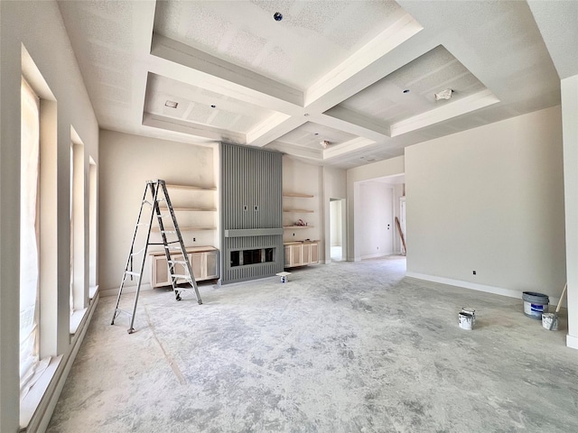 1162 Rd 6604, Dayton, TX 77535 - unfurnished living room featuring coffered ceiling, beamed ceiling, and carpet floors