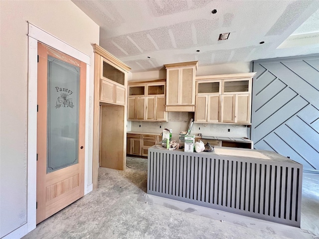 1162 Rd 6604, Dayton, TX 77535 - kitchen featuring light brown cabinetry, concrete floors, and open shelves