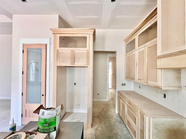 1162 Rd 6604, Dayton, TX 77535 - mudroom featuring a textured ceiling and unfinished concrete flooring