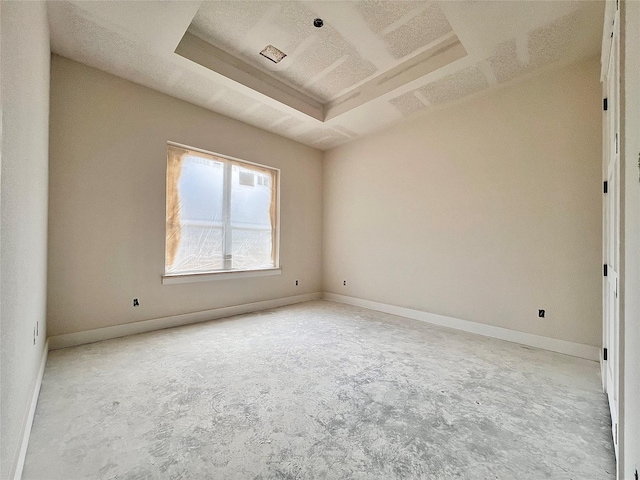 1162 Rd 6604, Dayton, TX 77535 - empty room with baseboards and a tray ceiling