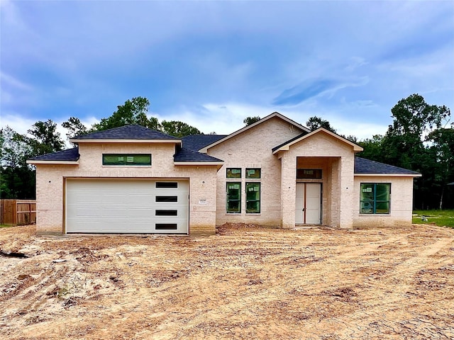 1162 Rd 6604, Dayton, TX 77535 - view of front of property with a shingled roof and dirt driveway