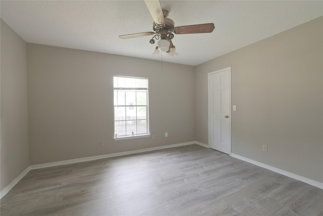 15918 Pinyon Creek Dr, Houston, TX 77095 - spare room featuring wood finished floors and a ceiling fan