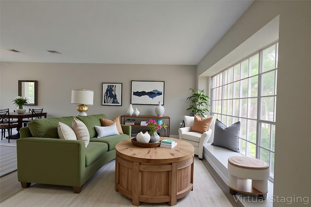 15918 Pinyon Creek Dr, Houston, TX 77095 - living area featuring plenty of natural light and light wood-style flooring