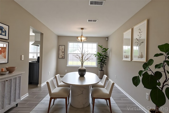 15918 Pinyon Creek Dr, Houston, TX 77095 - dining room featuring wood finished floors