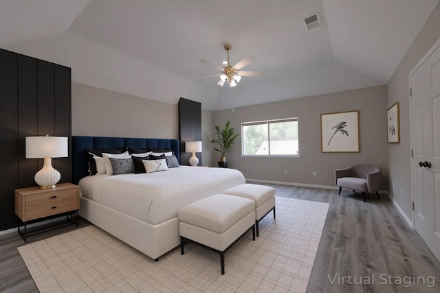 15918 Pinyon Creek Dr, Houston, TX 77095 - bedroom with wood finished floors, lofted ceiling, and ceiling fan