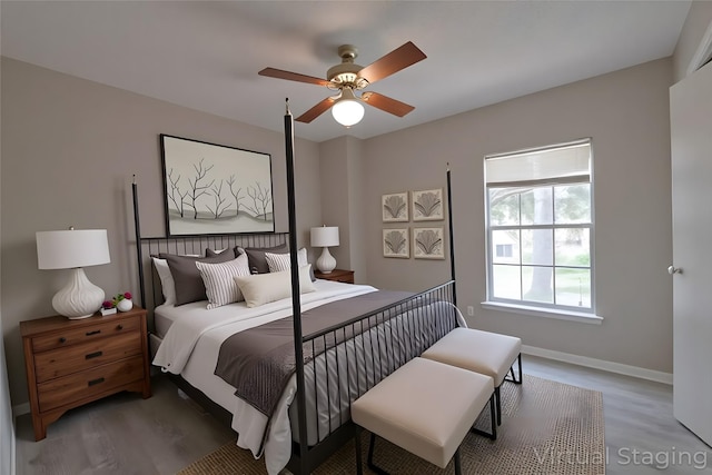 15918 Pinyon Creek Dr, Houston, TX 77095 - bedroom with wood finished floors and ceiling fan