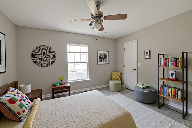 15918 Pinyon Creek Dr, Houston, TX 77095 - bedroom with wood finished floors and a ceiling fan