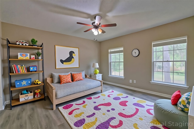15918 Pinyon Creek Dr, Houston, TX 77095 - bedroom with wood finished floors and ceiling fan