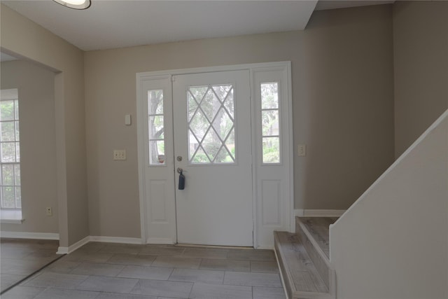 15918 Pinyon Creek Dr, Houston, TX 77095 - entrance foyer with baseboards and stairway