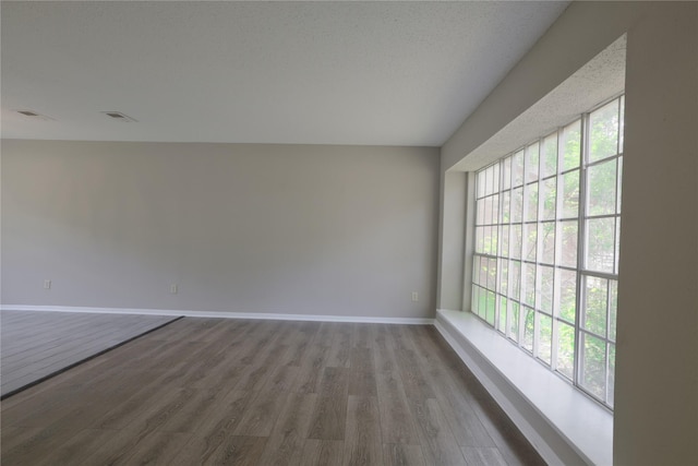 15918 Pinyon Creek Dr, Houston, TX 77095 - empty room with wood finished floors and baseboards
