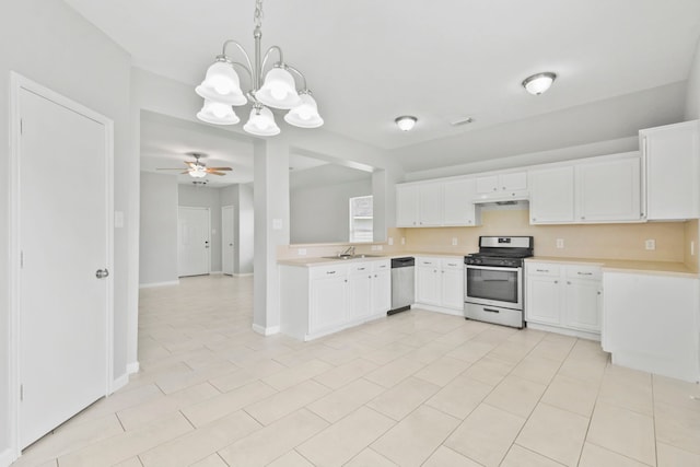 1611 Hade Meadow Ln, Houston, TX 77073 - kitchen featuring stainless steel appliances, a chandelier, light countertops, a ceiling fan, and white cabinetry