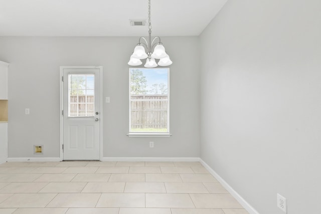 1611 Hade Meadow Ln, Houston, TX 77073 - unfurnished dining area with a chandelier and baseboards