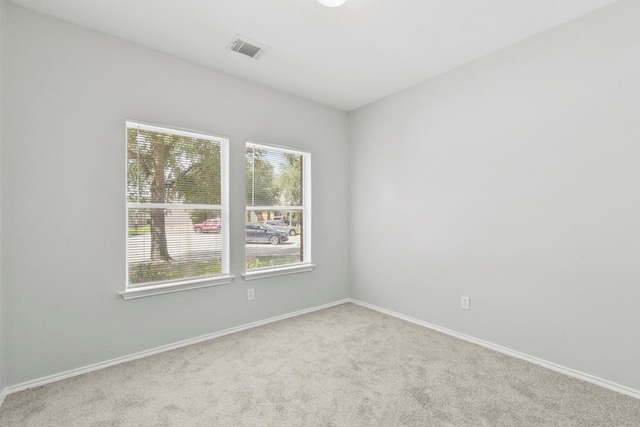 1611 Hade Meadow Ln, Houston, TX 77073 - carpeted empty room featuring healthy amount of natural light