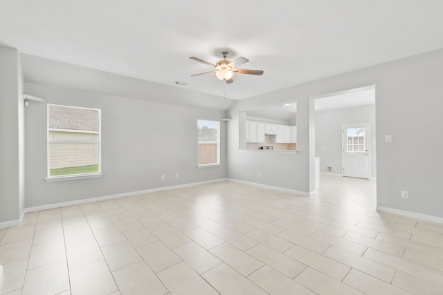 1611 Hade Meadow Ln, Houston, TX 77073 - unfurnished living room featuring a ceiling fan and healthy amount of natural light