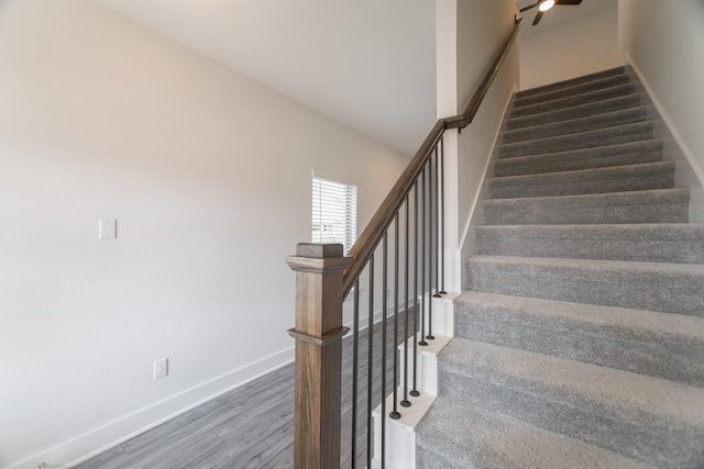 10663 Whitejacket, Conroe, TX 77385 - stairway with wood finished floors and baseboards