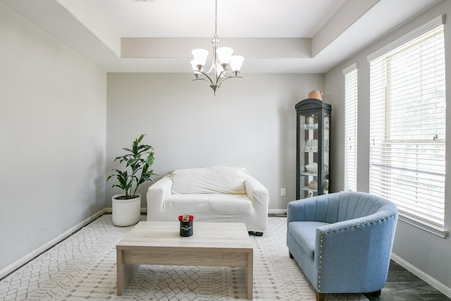 10219 Kentington Oak Dr, Humble, TX 77396 - sitting room with a tray ceiling, healthy amount of natural light, and a chandelier