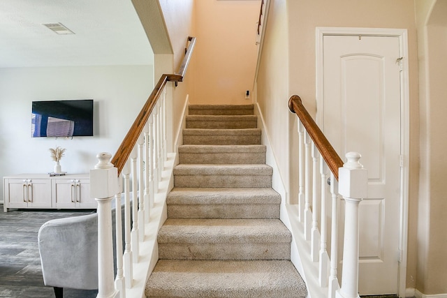 10219 Kentington Oak Dr, Humble, TX 77396 - stairs featuring wood finished floors