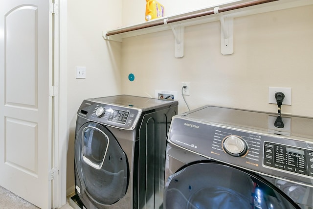 10219 Kentington Oak Dr, Humble, TX 77396 - laundry room with washing machine and dryer