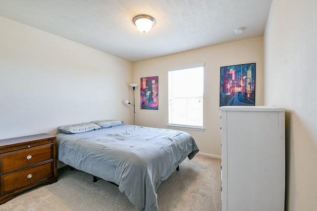 10219 Kentington Oak Dr, Humble, TX 77396 - bedroom with light carpet and baseboards