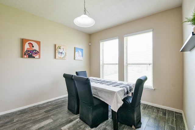 10219 Kentington Oak Dr, Humble, TX 77396 - dining area with dark wood-style floors and baseboards