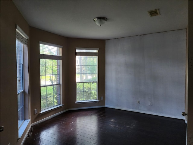 9510 Gentry Shadows Ln, Humble, TX 77396 - unfurnished room with dark wood-type flooring and baseboards